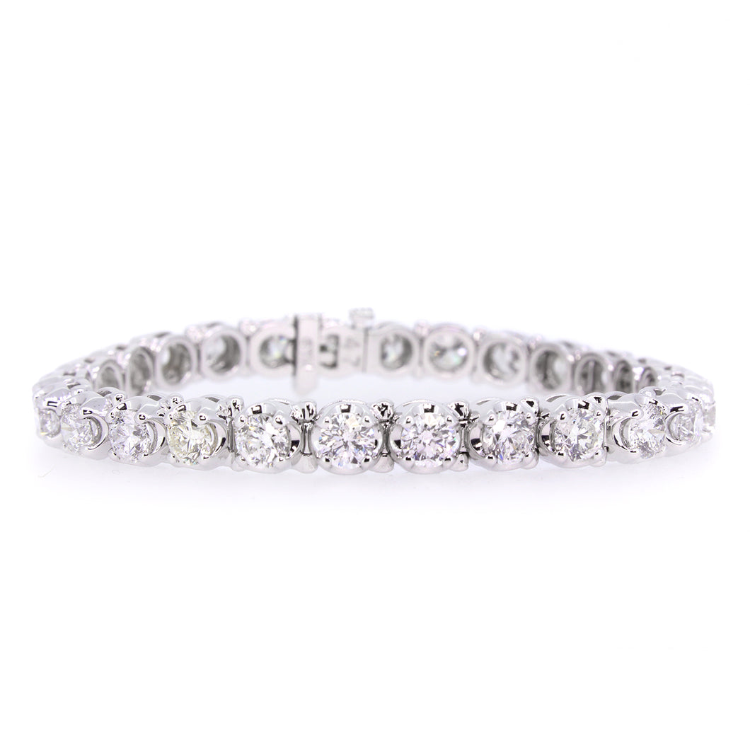 14KT white gold tennis bracelet with 11.13ctw round diamonds...