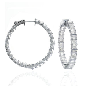 18KT white gold inside-out hoop earrings with 4.50ctw baguet...
