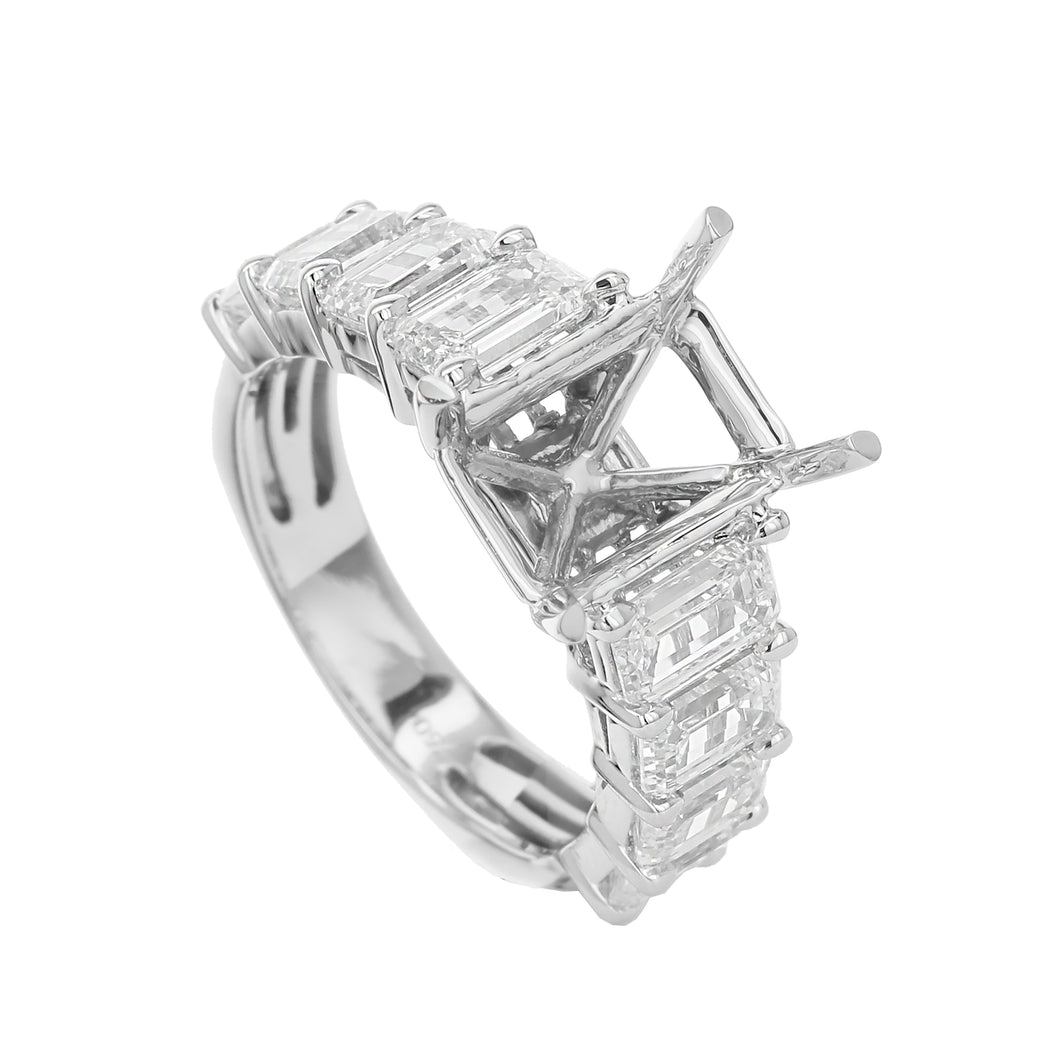 18KT white gold engagement ring with 3.00ctw graduated emera...