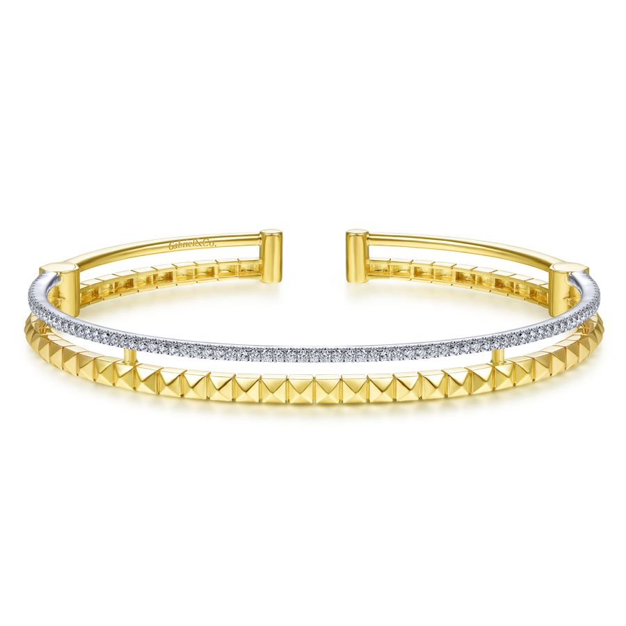 14KT yellow gold double hinged bangle with 0.44ctw round dia...