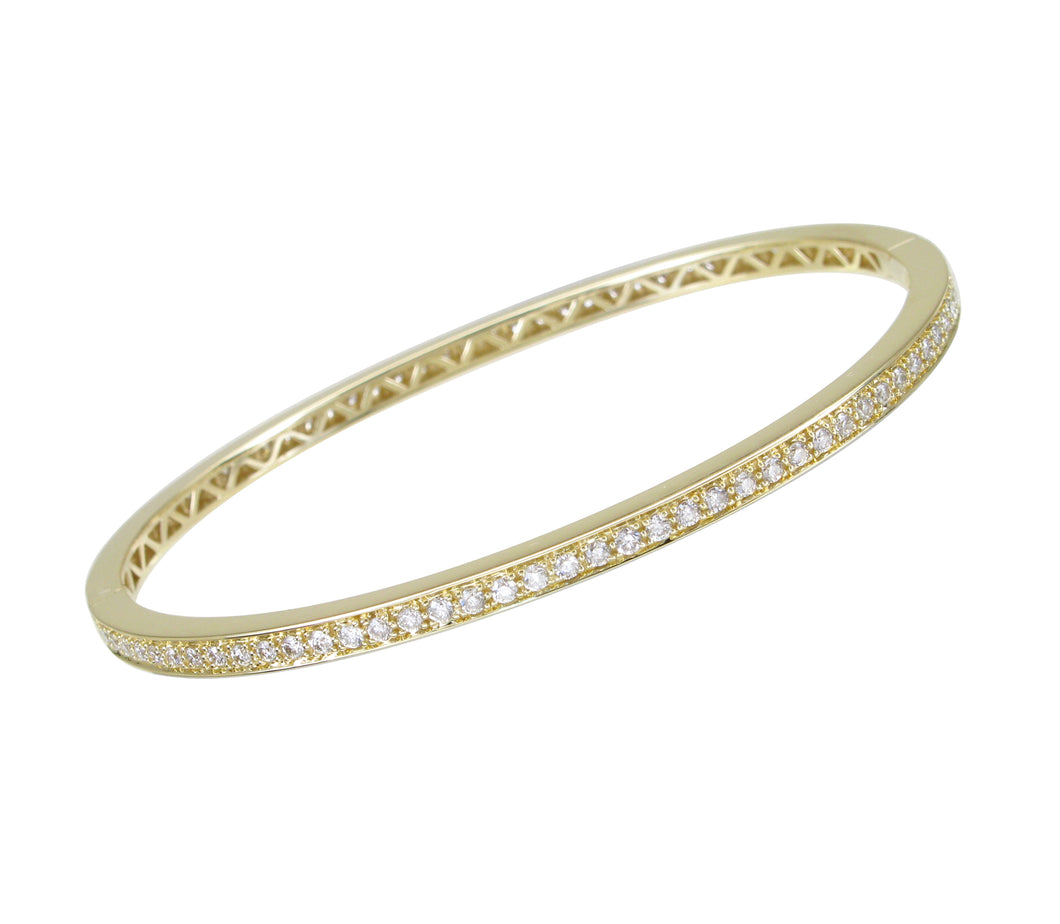 18KT yellow gold hinged eternity bangle with 1.35ctw round d...