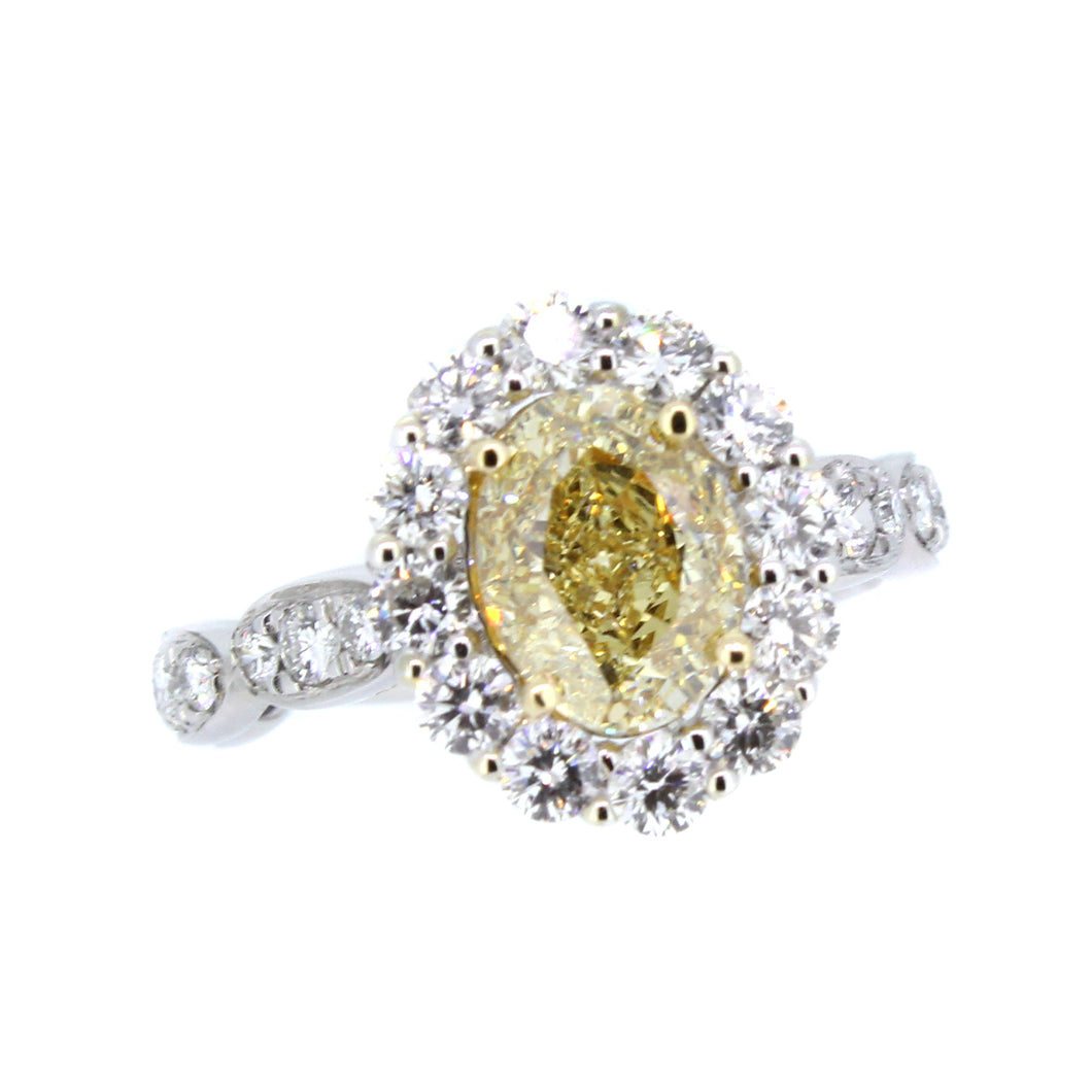 14KT white and yellow gold ring with 1.91ct oval yellow diam...