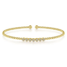 Load image into Gallery viewer, 14KT yellow gold Bujukan bead bangle bracelet with cluster d...
