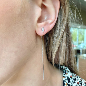 14KT white gold pass-through earrings with 0.14ctw round dia...