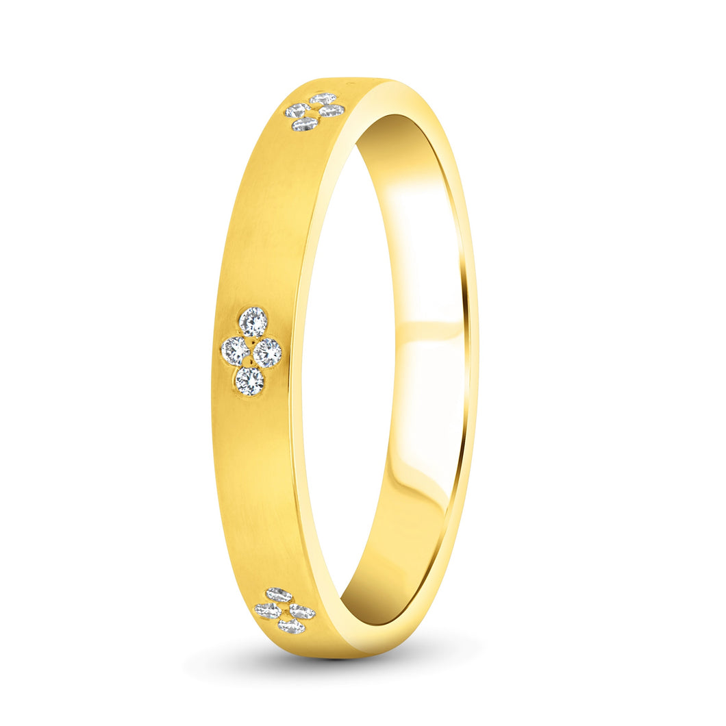 14KT yellow gold flush set band with 0.12ctw round diamonds,...