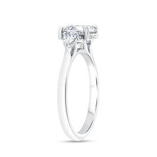 Load image into Gallery viewer, Platinum three stone engagment ring with 0.26ctw pear shaped...
