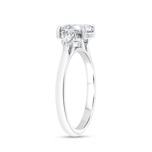 Platinum three stone engagment ring with 0.26ctw pear shaped...