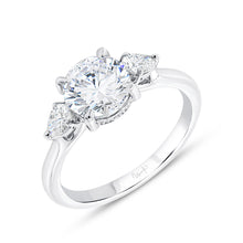 Load image into Gallery viewer, Platinum three stone engagment ring with 0.26ctw pear shaped...
