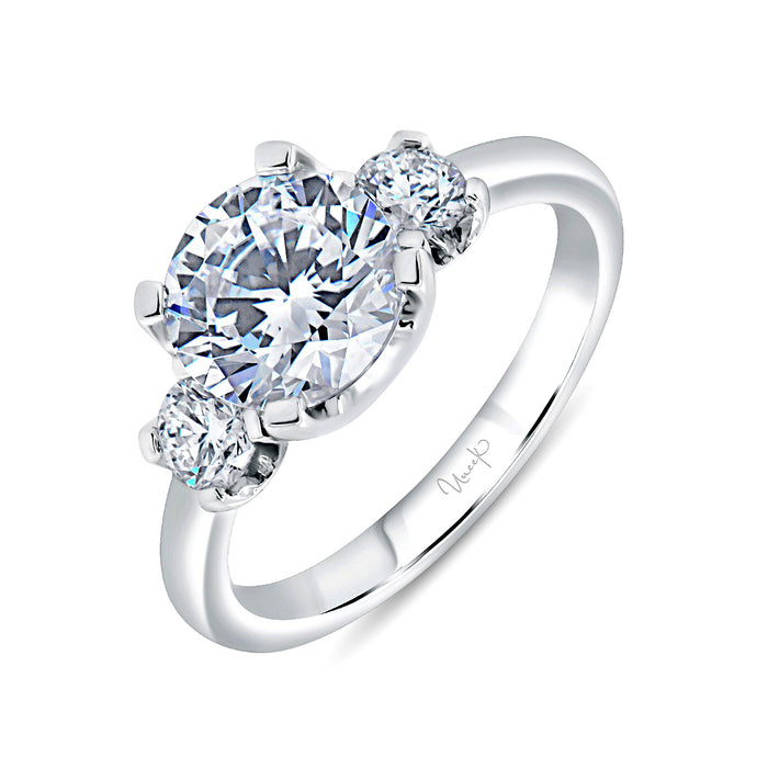 14KT white gold three stone engagement ring with 0.50ctw rou...