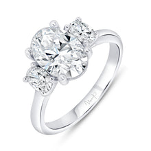 Load image into Gallery viewer, Platinum three-stone ring with 0.49ctw oval side diamonds, G...
