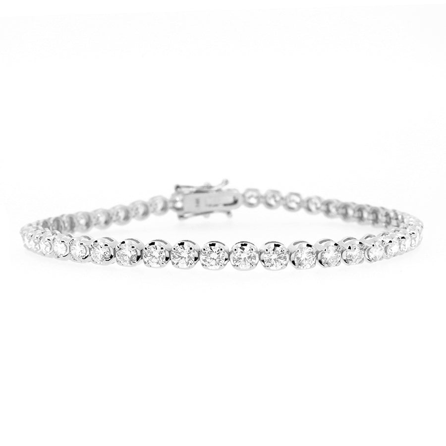 14KT white gold tennis bracelet with 4.01ctw round diamonds,...