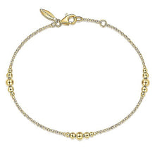 Load image into Gallery viewer, 14KT yellow gold chain bracelet with graduated bead stations...
