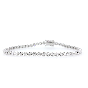 14KT white gold tennis bracelet with 1.20ctw round diamonds,...