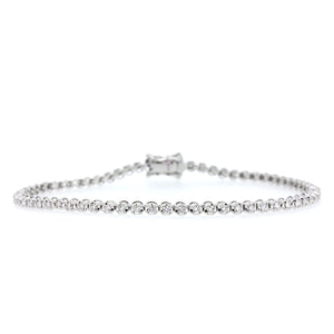 14KT white gold tennis bracelet with 0.89ctw round diamonds,...