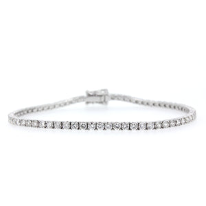 14KT white gold tennis bracelet with 3.15ctw round diamonds,...