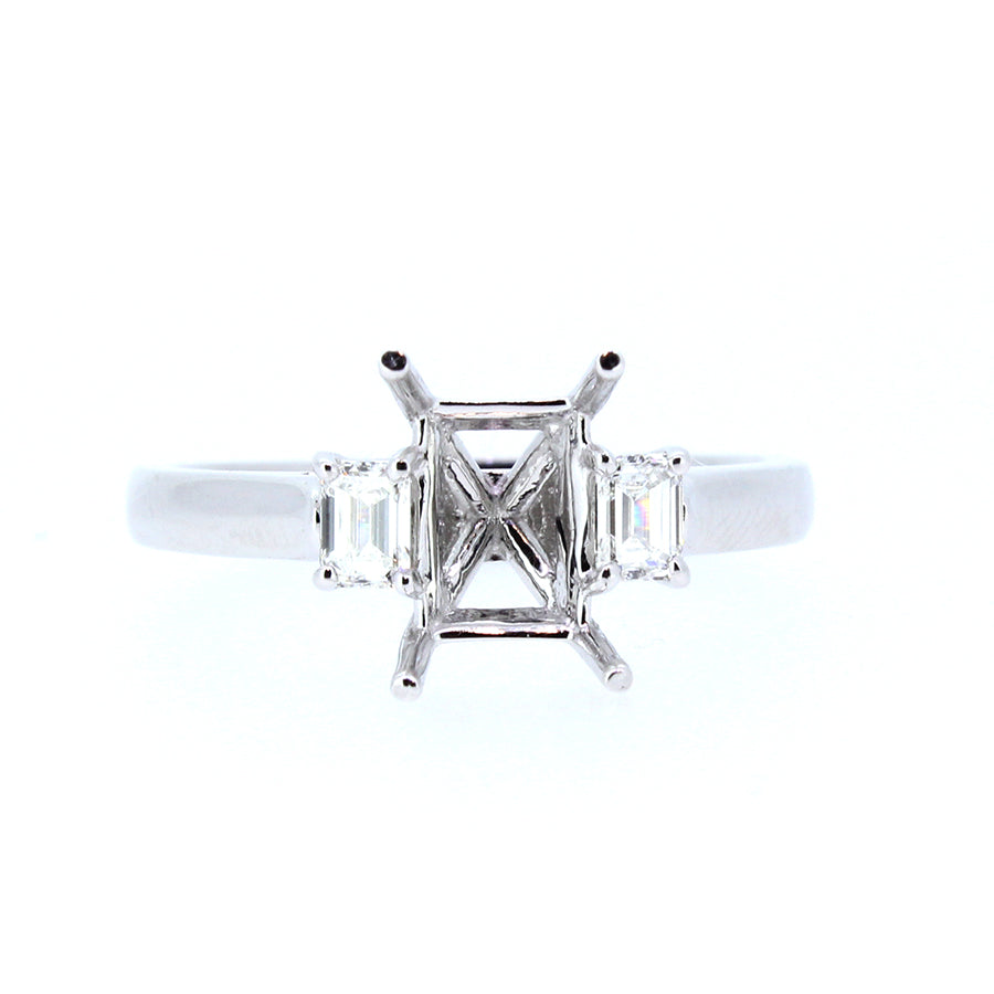 14KT white gold three-stone ring with 0.30ctw emerald cut si...