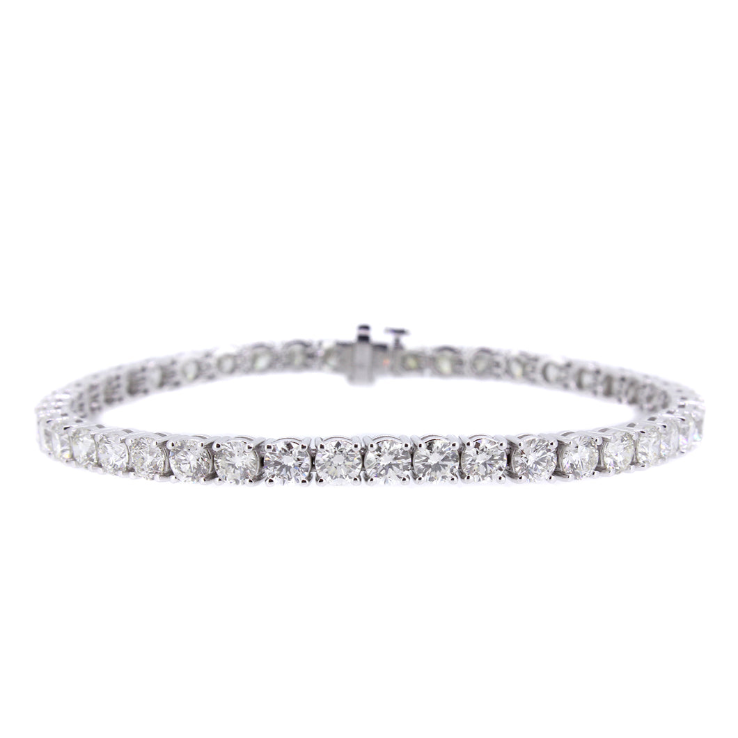 18KT white gold tennis bracelet with 9.95ctw round diamonds,...