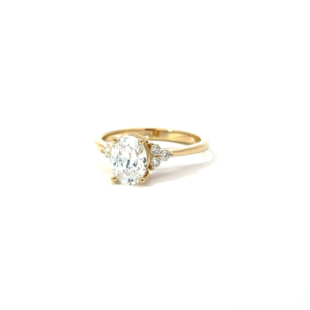 14KT yellow gold engagement ring with 0.15ctw round diamonds...