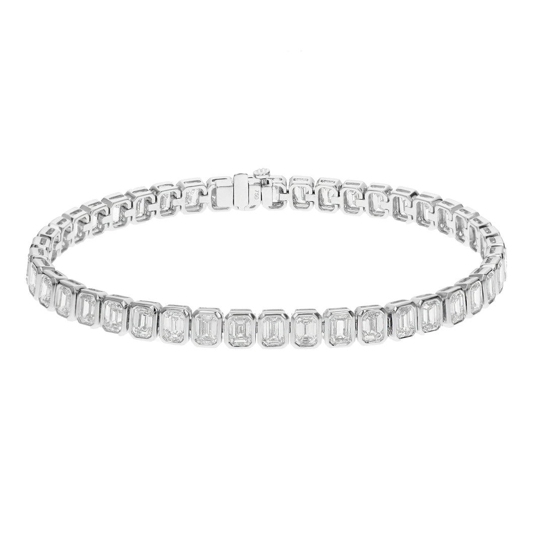 18KT white gold bezel set tennis bracelet with 10.00ctw emer...