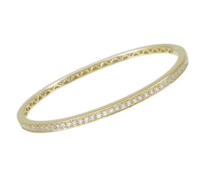 18KT yellow gold hinged eternity bangle with 1.35ctw round d...