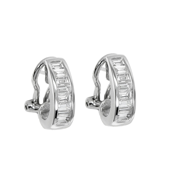 18KT white gold channel set earrings with 0.58ctw baguette d...