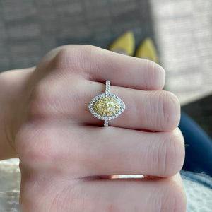18KT white and yellow gold ring with 0.59ct yellow marquise ...