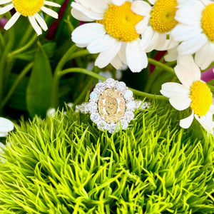 14KT white and yellow gold ring with 1.91ct oval yellow diam...