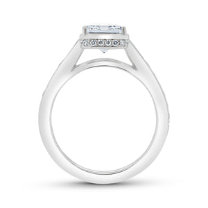 Platinum engagement ring with 0.36ctw round and 0.20ctw bagu...