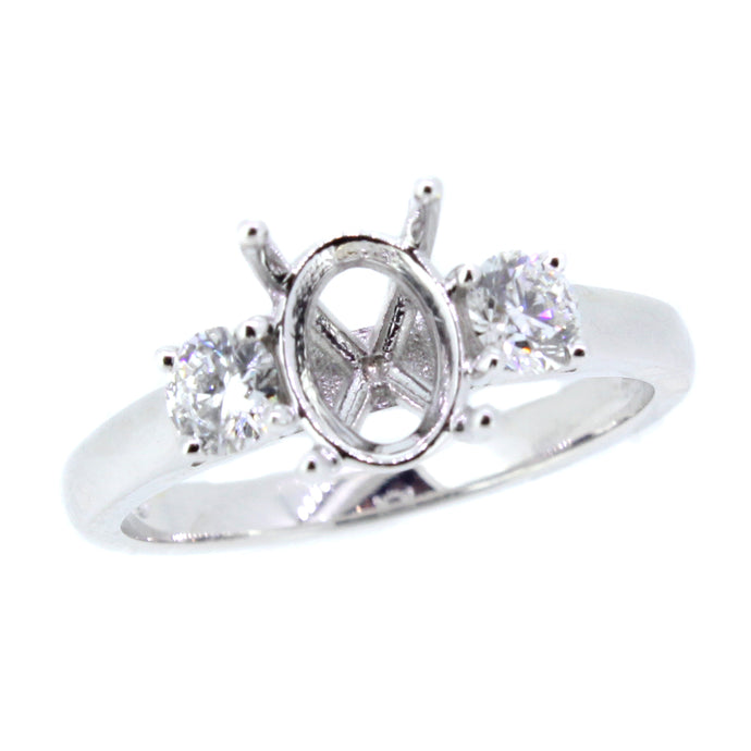 14KT white gold three-stone ring with 0.50ctw round side dia...