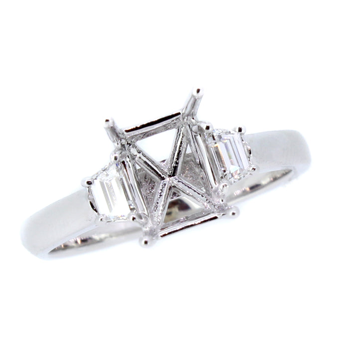 14KT white gold three-stone ring with 0.42ctw trapezoid side...