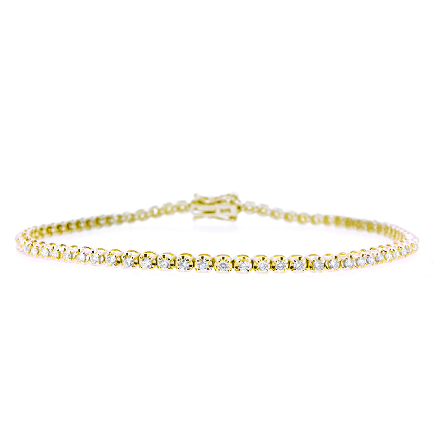 14KT yellow gold tennis bracelet with 0.98ctw round diamonds...